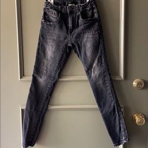 Boys faded wash black jeans.